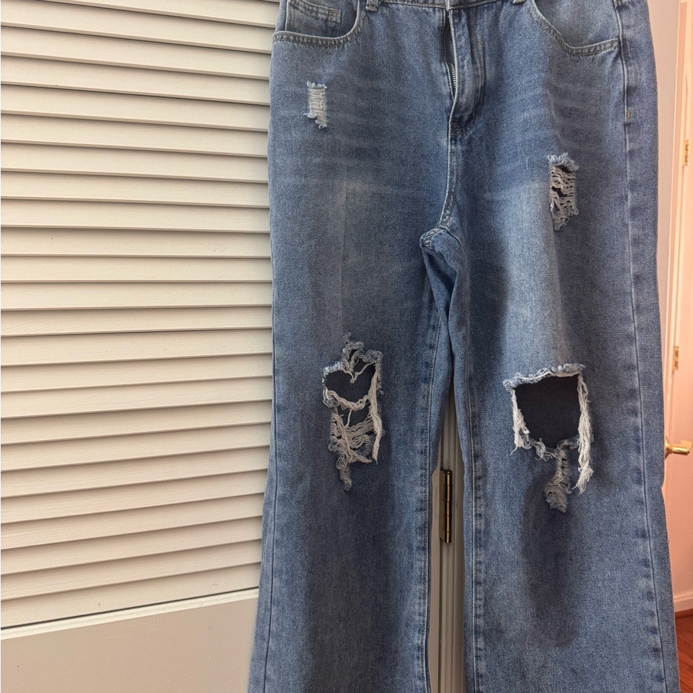 Distressed Blue Jeans